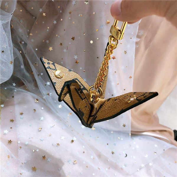 2020 new thousand paper cranes key chain pendant women's bag accessories manufacturers direct, Silver
2020 new thousand paper cranes key chain pendant women's bag accessories manufacturers direct, Silver