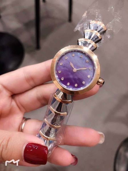 33mm mother of pearl purple dial gold bezel womens watches two tone stainless steel bracelet quartz battery ladies watch, Slivery;brown
33mm mother of pearl purple dial gold bezel womens watches two tone stainless steel bracelet quartz battery ladies watch, Slivery;brown