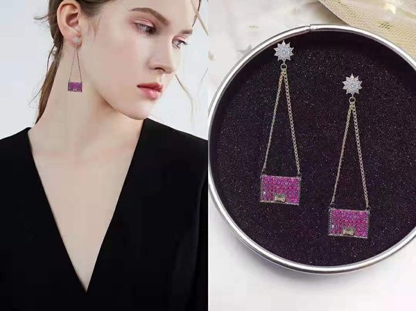 the factory directly sells micro-inlaid zircon bags with individual earrings with a variety of temperament, Silver
the factory directly sells micro-inlaid zircon bags with individual earrings with a variety of temperament, Silver