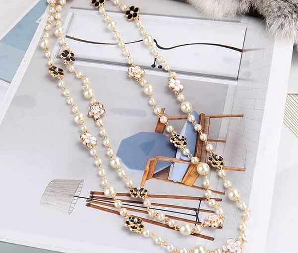 wholesale- luxury designer classic style elegant flowers white pearls long chain sweater statement necklace for woman, Black
wholesale- luxury designer classic style elegant flowers white pearls long chain sweater statement necklace for woman, Black