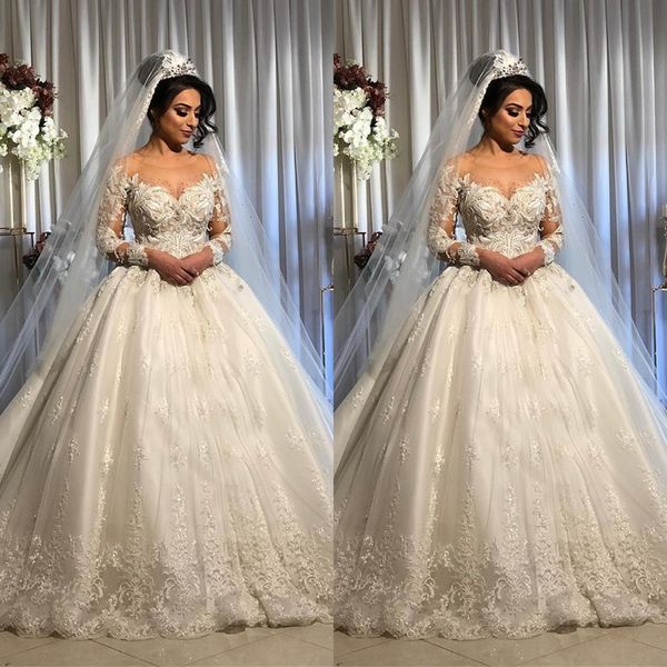 vintage arabic ball gown wedding dresses jewel neck long sleeves illusion lace applique crystal beaded plus size formal bridal gowns, White
vintage arabic ball gown wedding dresses jewel neck long sleeves illusion lace applique crystal beaded plus size formal bridal gowns, White
