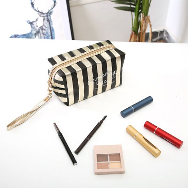 new phnom penh stripe cosmetic bag pu leather laser anise storage bag lady clutch portable toiletry
new phnom penh stripe cosmetic bag pu leather laser anise storage bag lady clutch portable toiletry