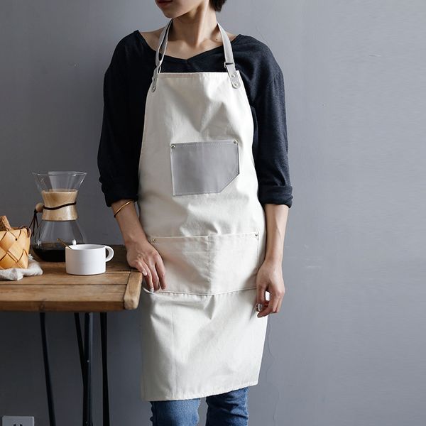new fashion canvas cotton aprons for women men adjustable leather strap apron with leather pocket and center pockets pinafore
new fashion canvas cotton aprons for women men adjustable leather strap apron with leather pocket and center pockets pinafore