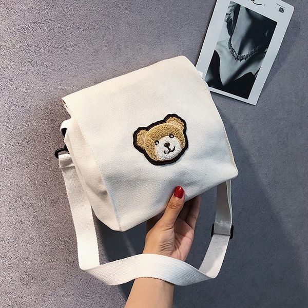 cute little bear vintage sense simple girl messenger bag small bag female korean version of the canvas shoulder
cute little bear vintage sense simple girl messenger bag small bag female korean version of the canvas shoulder