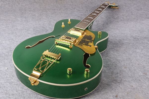 Gre falcon g6120 metallic green chet atkin country jazz emi hollow body electric guitar pearloid hump block inlay gold trapeze tailpiece33
Gre falcon g6120 metallic green chet atkin country jazz emi hollow body electric guitar pearloid hump block inlay gold trapeze tailpiece33