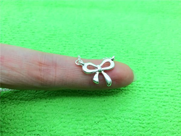 10 small bow-knot charm pendant necklace korea super sweet bow cute girl simple clavicle beautiful lucky woman mother men's family gift, Silver
10 small bow-knot charm pendant necklace korea super sweet bow cute girl simple clavicle beautiful lucky woman mother men's family gift, Silver