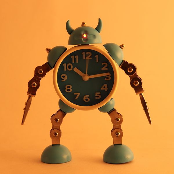 deformation robot alarm clock creative student small alarm clock cute children cartoon metal table
deformation robot alarm clock creative student small alarm clock cute children cartoon metal table