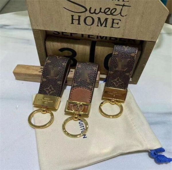 2020 fashion keychain designer key chain real leather with stainless steel keychain keyring in golden with brown with box, Silver
2020 fashion keychain designer key chain real leather with stainless steel keychain keyring in golden with brown with box, Silver