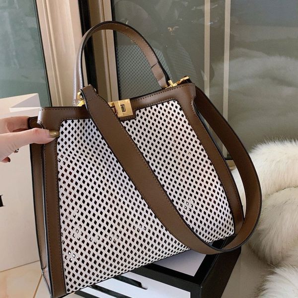women fashion handbag shoulder bag crossbody handbag fashion high-end genuine leather handbag lady wallet big pouch hollow out ing
women fashion handbag shoulder bag crossbody handbag fashion high-end genuine leather handbag lady wallet big pouch hollow out ing