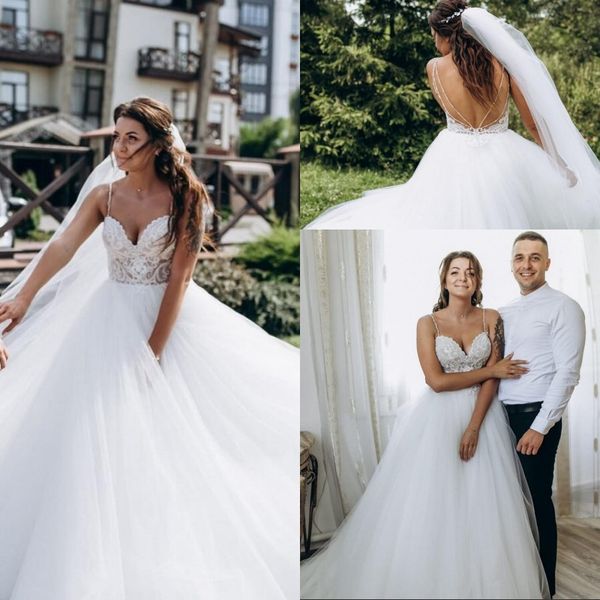 chic lace a line white wedding dresses spaghetti strap backless tulle long bridal gowns country style plus size vestidos de novia
chic lace a line white wedding dresses spaghetti strap backless tulle long bridal gowns country style plus size vestidos de novia