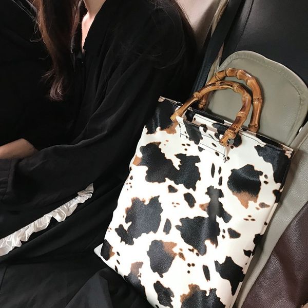 2020 new ins wind bag female retro milk cow pattern large capacity bamboo handbag fashion bolsa feminina torebki damskie
2020 new ins wind bag female retro milk cow pattern large capacity bamboo handbag fashion bolsa feminina torebki damskie