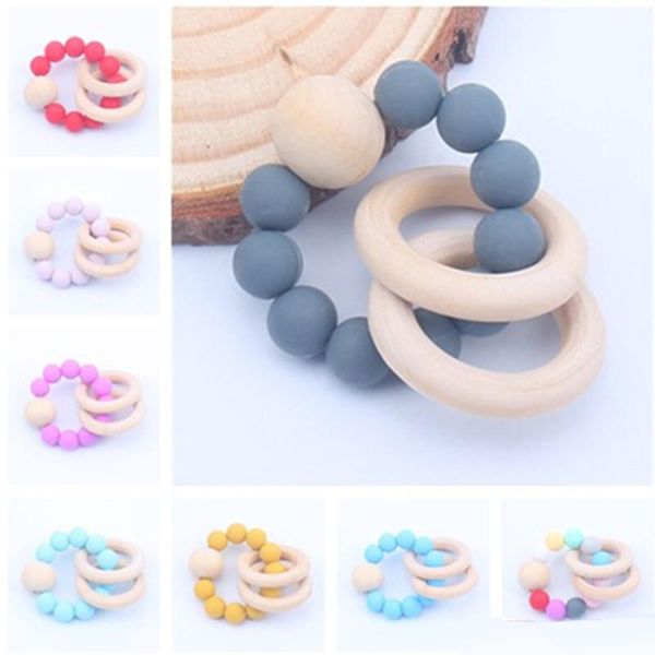 2020 new baby teether rings food grade beech wood teething ring soothers chew toys shower play chew round wooden bead silicone teether
2020 new baby teether rings food grade beech wood teething ring soothers chew toys shower play chew round wooden bead silicone teether
