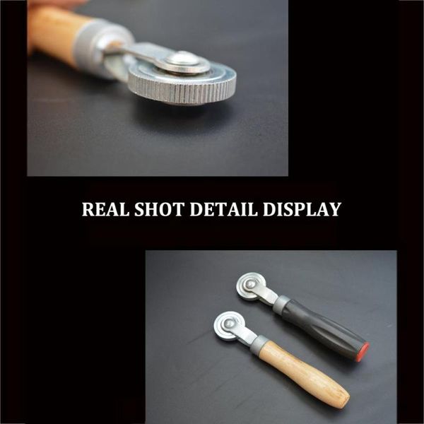 wooden handle tire compaction roller rubber anti-slip handle cold film pressure roller car tire repair tools
wooden handle tire compaction roller rubber anti-slip handle cold film pressure roller car tire repair tools