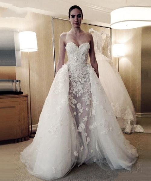 modest beaded appliques overskirt wedding dresses zipper up back sleeveless bridal dresses custom made wedding gowns with detachable train, White
modest beaded appliques overskirt wedding dresses zipper up back sleeveless bridal dresses custom made wedding gowns with detachable train, White