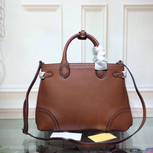 the banner designer luxury handbag purse genuine leather women fashion totes purses ladies handbag barbeery purses bag
the banner designer luxury handbag purse genuine leather women fashion totes purses ladies handbag barbeery purses bag