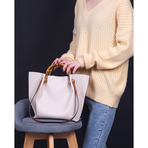 women's bags new fashion bags slung slung slung bamboo handbag atmosphere joker tote bag tide
women's bags new fashion bags slung slung slung bamboo handbag atmosphere joker tote bag tide