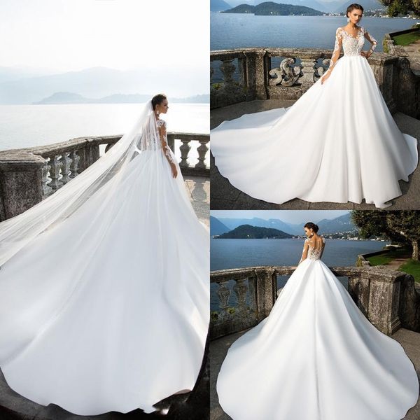 new arrival pure white a line wedding dresses sheer neck long sleeves lace appplique button back illusion vintage satin wedding gowns custom
new arrival pure white a line wedding dresses sheer neck long sleeves lace appplique button back illusion vintage satin wedding gowns custom