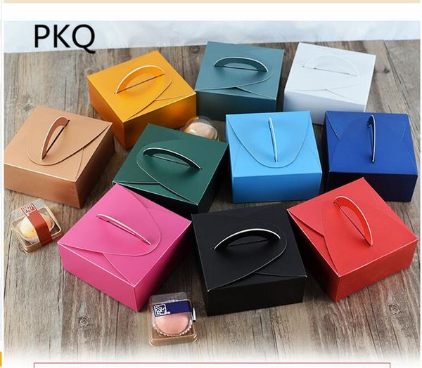 10pcs 14*14*6.5cm dessert packaging handle box small cardboard paper box cake moon cake tray festive christmas party gift
10pcs 14*14*6.5cm dessert packaging handle box small cardboard paper box cake moon cake tray festive christmas party gift