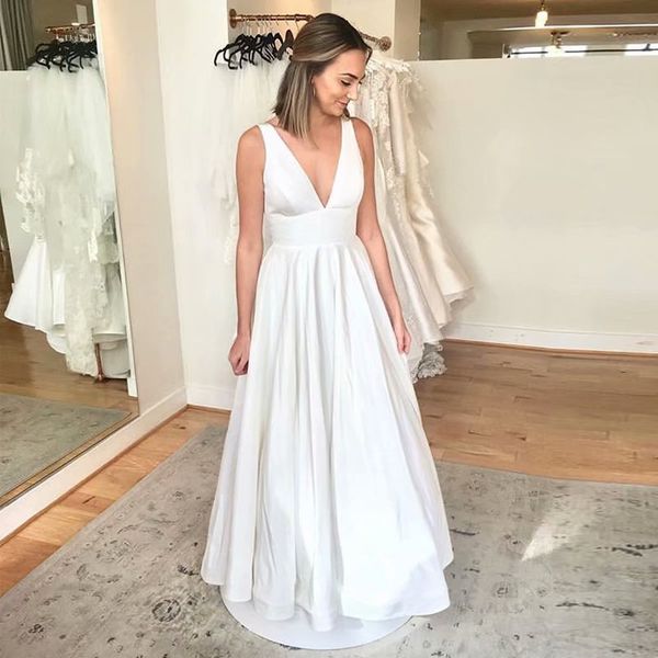 элегантный глубокий v-образным вырезом line свадебные платья white satin платье венчания пляжа низкий v назад с большой лук модест свадебные
элегантный глубокий v-образным вырезом line свадебные платья white satin платье венчания пляжа низкий v назад с большой лук модест свадебные