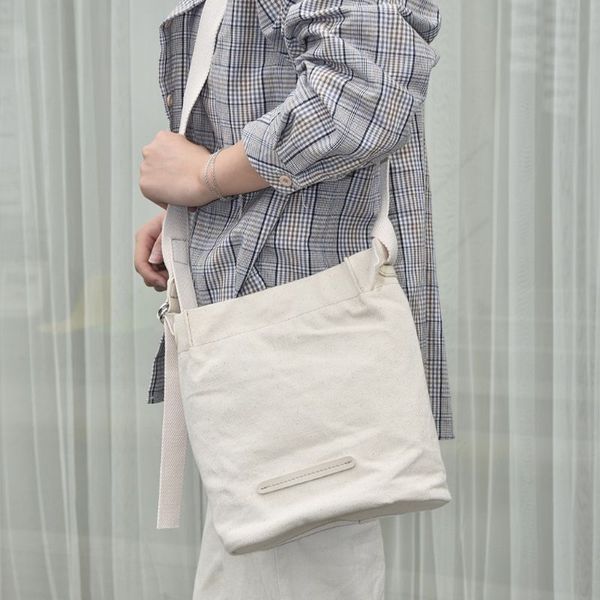 women women bucket canvas shoulder bag solid color large capacity casual art style delicate hardware shopping ladies handbag 2
women women bucket canvas shoulder bag solid color large capacity casual art style delicate hardware shopping ladies handbag 2