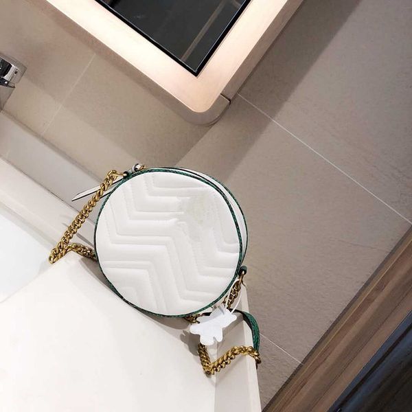 the new spring/summer 2020 show women's super brim round cakes handbags chain inclined shoulder bag
the new spring/summer 2020 show women's super brim round cakes handbags chain inclined shoulder bag