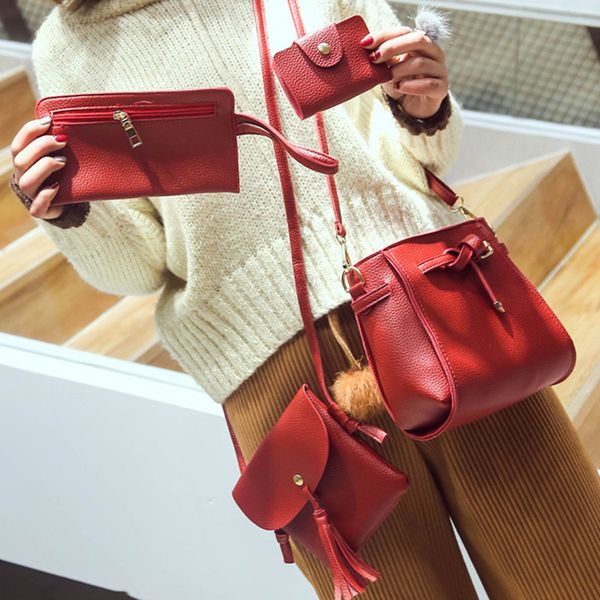 the new korean version of the bucket tassel ladies shoulder bag bag four messenger mobile wallet
the new korean version of the bucket tassel ladies shoulder bag bag four messenger mobile wallet