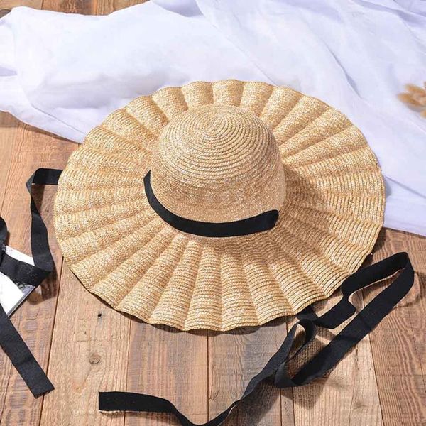 natural large wide brim wavy ruffles hats raffia straw hat women summer fringe beach hat weave sun with black&white belt, Blue;gray
natural large wide brim wavy ruffles hats raffia straw hat women summer fringe beach hat weave sun with black&white belt, Blue;gray