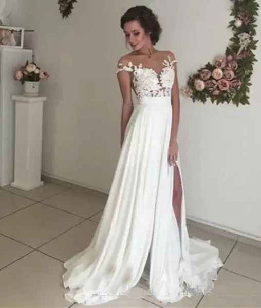 Cap Sleeves Country Wedding Dresses Cheap with Slit Summer Illusion Back Wedding Dresses Beach Bridal Gowns Custom Made Vestidos De Novia
Cap Sleeves Country Wedding Dresses Cheap with Slit Summer Illusion Back Wedding Dresses Beach Bridal Gowns Custom Made Vestidos De Novia