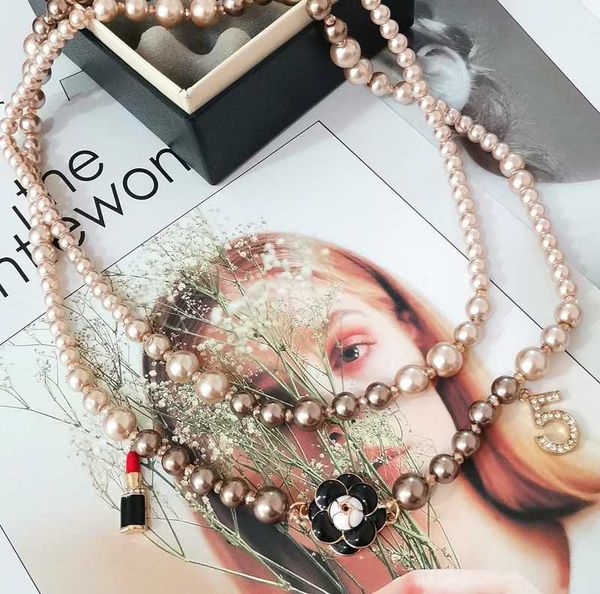 long simulated pearl necklace for women camellia lip no.5 pendant long necklace party jewelry, Golden;silver
long simulated pearl necklace for women camellia lip no.5 pendant long necklace party jewelry, Golden;silver