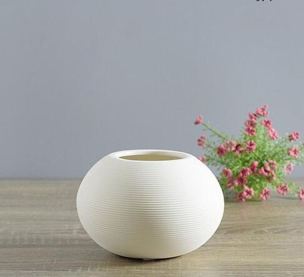 de cerámica de jarrón adornos joyas creativo muebles para el hogar blanco pequeño florero decorado con arte moderno cerámica home
de cerámica de jarrón adornos joyas creativo muebles para el hogar blanco pequeño florero decorado con arte moderno cerámica home