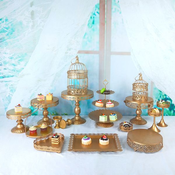 tobs metal gold cake stand set for wedding cup cake holder decorating tools candy bar stand tray suppliers
tobs metal gold cake stand set for wedding cup cake holder decorating tools candy bar stand tray suppliers