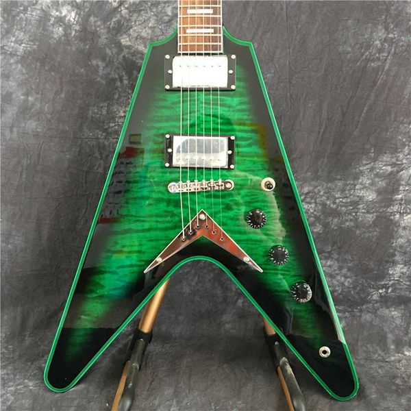 green v-shaped electric guitar, equipped with silver hardware, string pass, tiger pattern veneer, can be customized according to requirement
green v-shaped electric guitar, equipped with silver hardware, string pass, tiger pattern veneer, can be customized according to requirement