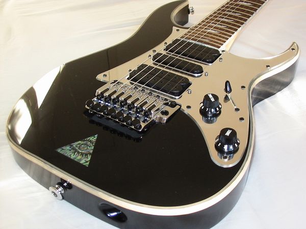

uv777 universe steve 7 string black electric guitar mirror pickguard, floyd rose tremolo, abalone disappearing pyramid inlay, hsh pickups