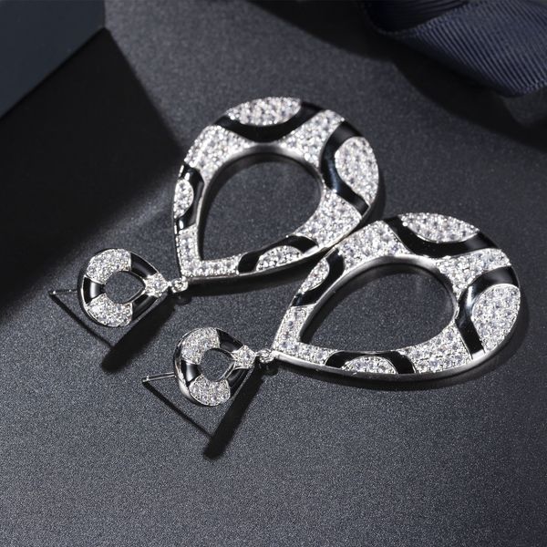 2019 new zircon european and american fashion brand earrings oil dropping black earrings speedy buyton explosion factory for special purchas, Golden;silver
2019 new zircon european and american fashion brand earrings oil dropping black earrings speedy buyton explosion factory for special purchas, Golden;silver