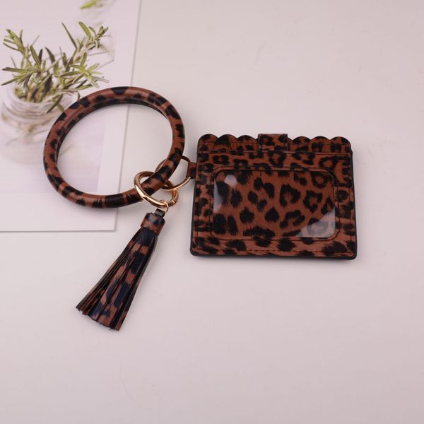 2020 new sell leopard snake wallet pu leather tassel card bag keychain bag for women men fashion bracelet keychain jewelry, Silver
2020 new sell leopard snake wallet pu leather tassel card bag keychain bag for women men fashion bracelet keychain jewelry, Silver