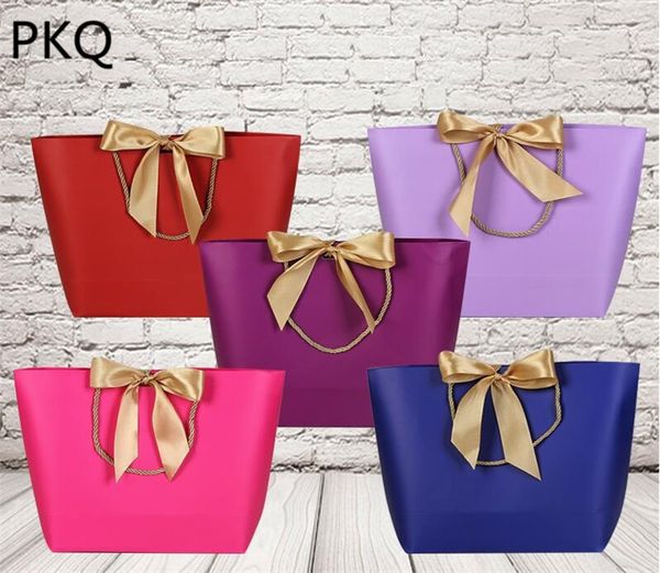 pink wedding party gift bag paper bag with handle gift packaging clothing shoes jewelry packaging paper bags
pink wedding party gift bag paper bag with handle gift packaging clothing shoes jewelry packaging paper bags