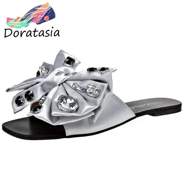 doratasia женщины rhinestone скольжения на плоской подошве повседневная пляж тапочки лета женщин открытым носком бабочка узел тапочки, Black
doratasia женщины rhinestone скольжения на плоской подошве повседневная пляж тапочки лета женщин открытым носком бабочка узел тапочки, Black
