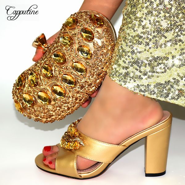 luxury gold with stones african lady high heel slipper shoes and bag set for lady 239-1 heel height 10cm, Black
luxury gold with stones african lady high heel slipper shoes and bag set for lady 239-1 heel height 10cm, Black