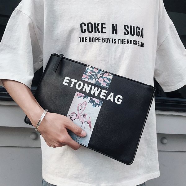 the new fashion leather trendy men's hand bag simple men's small bag young hand clutch
the new fashion leather trendy men's hand bag simple men's small bag young hand clutch