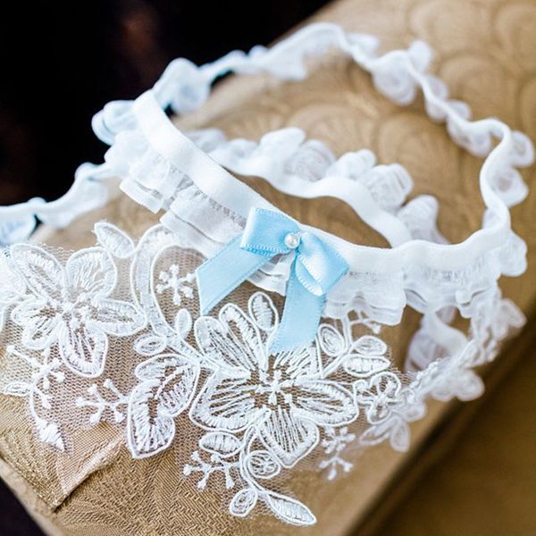1 pair wedding garter white garter set bridal vintage lace flower toss with blue bow, Black;white
1 pair wedding garter white garter set bridal vintage lace flower toss with blue bow, Black;white