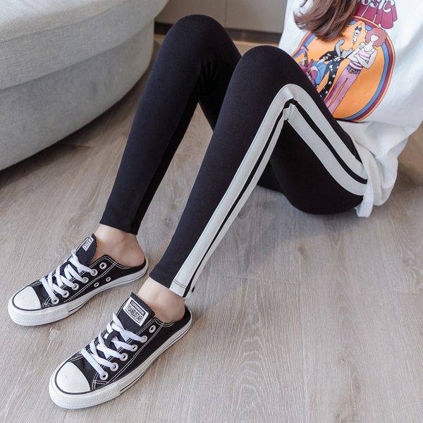autumn and winter high waist black side white double broadband sports tights women plus fat stretch nine pants
autumn and winter high waist black side white double broadband sports tights women plus fat stretch nine pants