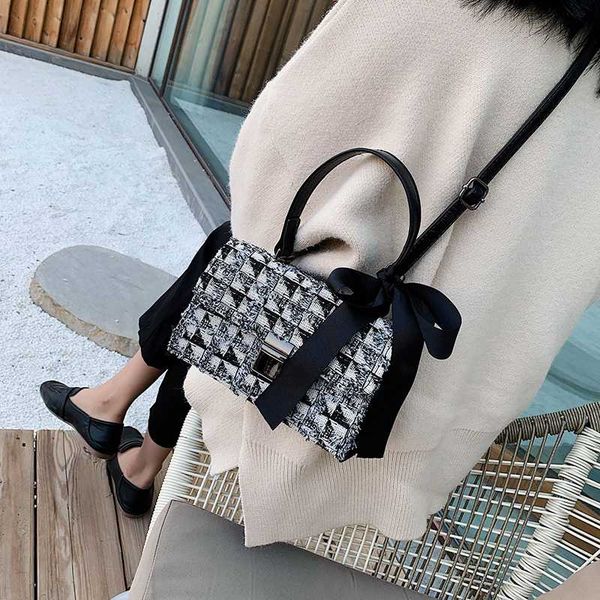 on the new portable mini bag women's bag all-match ins texture shoulder/crossbody spring and summer square sling fashion
on the new portable mini bag women's bag all-match ins texture shoulder/crossbody spring and summer square sling fashion