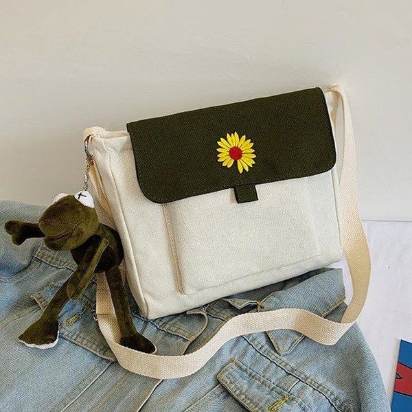 summer new canvas female bag printed one-shoulder contrast color magnetic buckle super fire wild small daisy crossbody bag
summer new canvas female bag printed one-shoulder contrast color magnetic buckle super fire wild small daisy crossbody bag