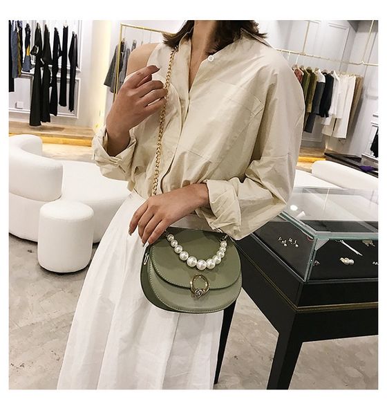 2019 new trend lady small fresh shoulder slung handbag wild pearl chain outdoor leisure saddle bag
2019 new trend lady small fresh shoulder slung handbag wild pearl chain outdoor leisure saddle bag