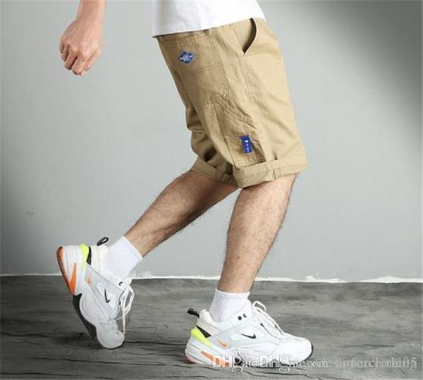 summer mens cargo shorts loose knee length zipper short pants with pockets, White;black
summer mens cargo shorts loose knee length zipper short pants with pockets, White;black