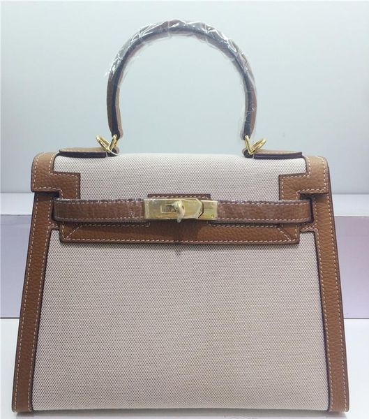 28cm 2019 brand women totes genuine leather canvas two-tone shoulder bags with lock strap lady fashion handbag wholesale
28cm 2019 brand women totes genuine leather canvas two-tone shoulder bags with lock strap lady fashion handbag wholesale