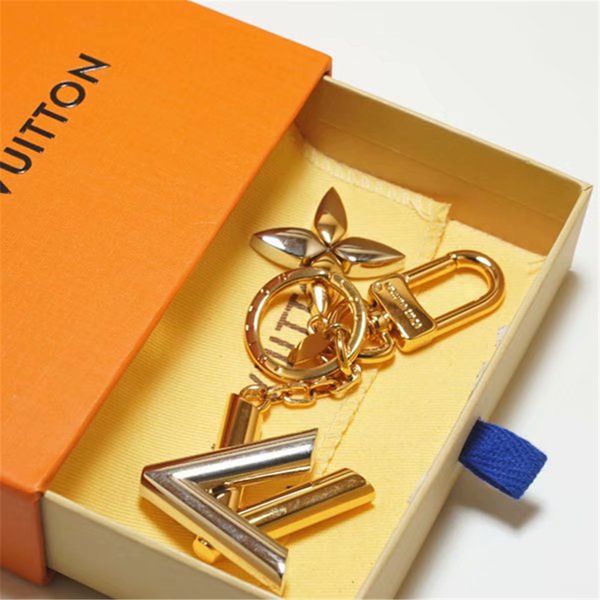 exquisite four-leaf flower letter luxury keychain multi pendant bag charm fashion key chain, Silver
exquisite four-leaf flower letter luxury keychain multi pendant bag charm fashion key chain, Silver
