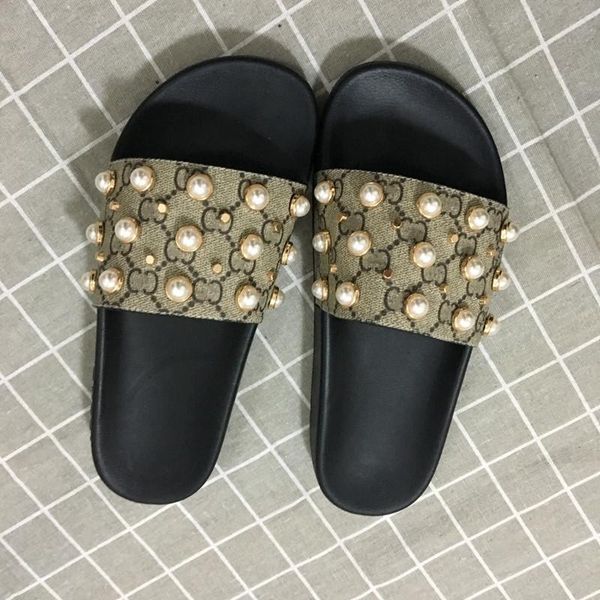 new arrival mens and womens fashion causal designer sandals with pearl effect and gold toned studs designer flip flops
new arrival mens and womens fashion causal designer sandals with pearl effect and gold toned studs designer flip flops