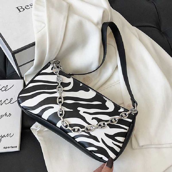 new french design fashion zebra pattern armpit bag handbag & elegant cow pattern chain shoulder bag width 27cm height 13cm
new french design fashion zebra pattern armpit bag handbag & elegant cow pattern chain shoulder bag width 27cm height 13cm