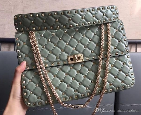 fashion style imported first layer lambskin genuine leather eighteen color l size high quailt with light gold rivet women cross shoulder bag
fashion style imported first layer lambskin genuine leather eighteen color l size high quailt with light gold rivet women cross shoulder bag